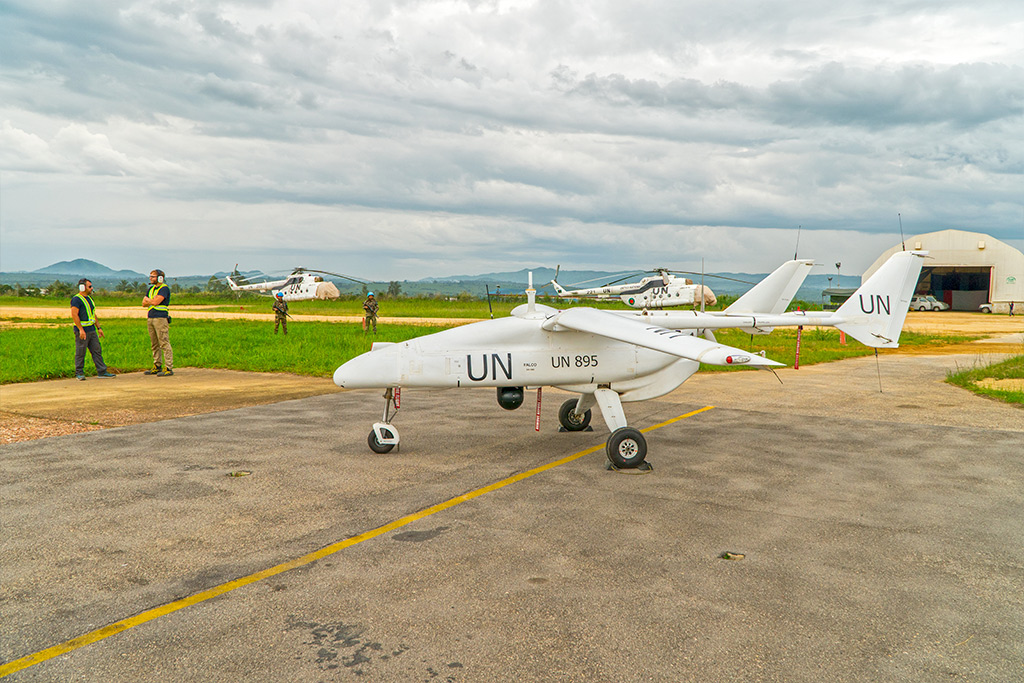 A UUAV fuels up before taking off on a reconnaissance flight in eastern Democratic Republic of the Congo (DRC). Starting with the DRC in 2013, several missions have employed unarmed and unmanned aerial vehicles (UUAVs). The UUAVs provide real-time visuals of situations as they develop on the ground. By improving response times, the UUAVs allow the UN to better protect civilians. UUAVs can also warn of impending attacks against peacekeepers. UN Photo/Sylvain Liechti
